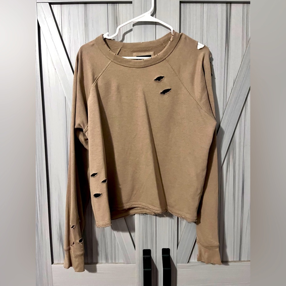 Women’s distressed sweater